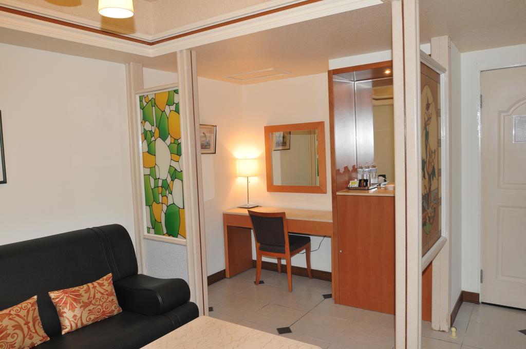 Hua Guo Hotel Cơ Long Phòng bức ảnh